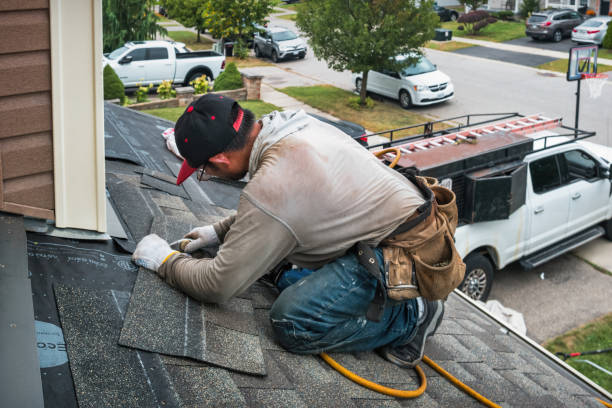 Professional Emergency Roof Repair technician working in Massapequa Park, NY